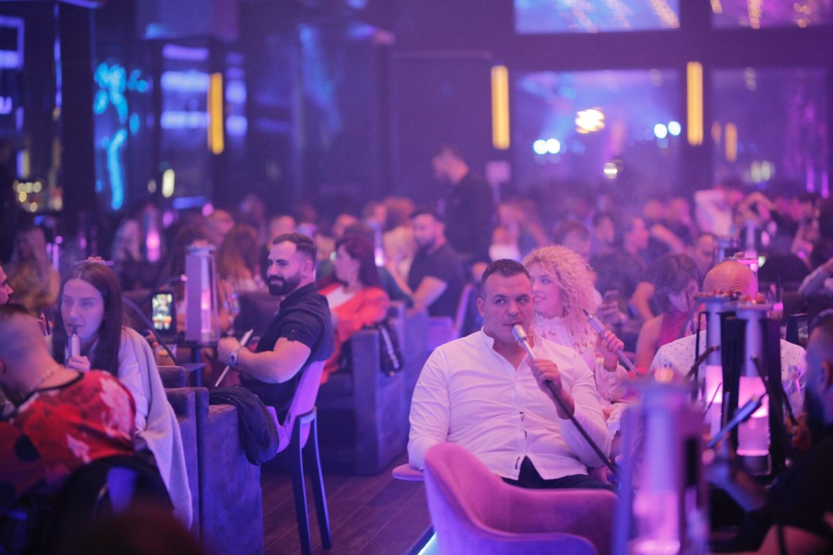 Luxury shisha pipe on a rooftop bar table in contemporary hospitality service
